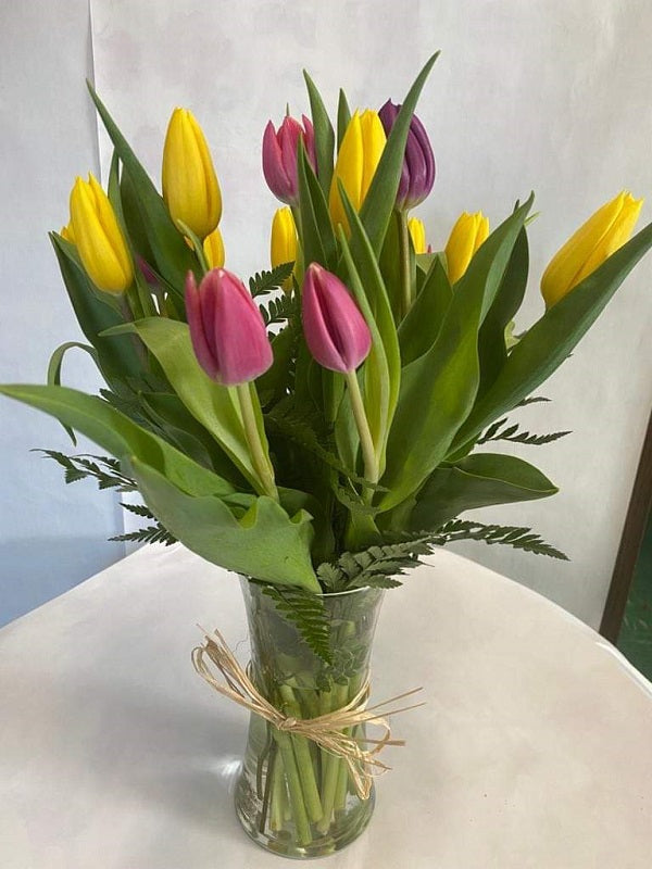 Fresh Cut Tulips in Clear Vase image 0