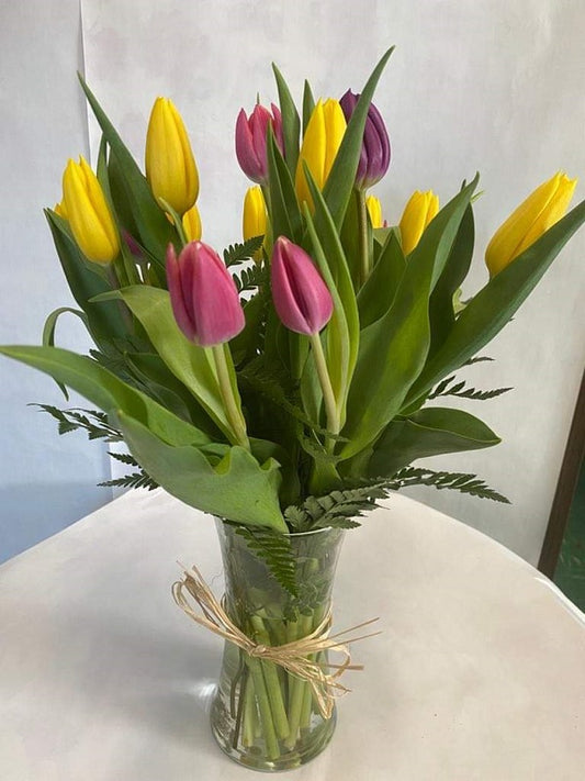 Fresh Cut Tulips in Clear Vase image 0